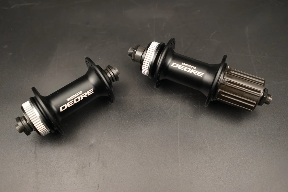 Передняя и задняя ступицы Shimano Deore HB M615 центральный замок передний QR 9x100 мм/задний