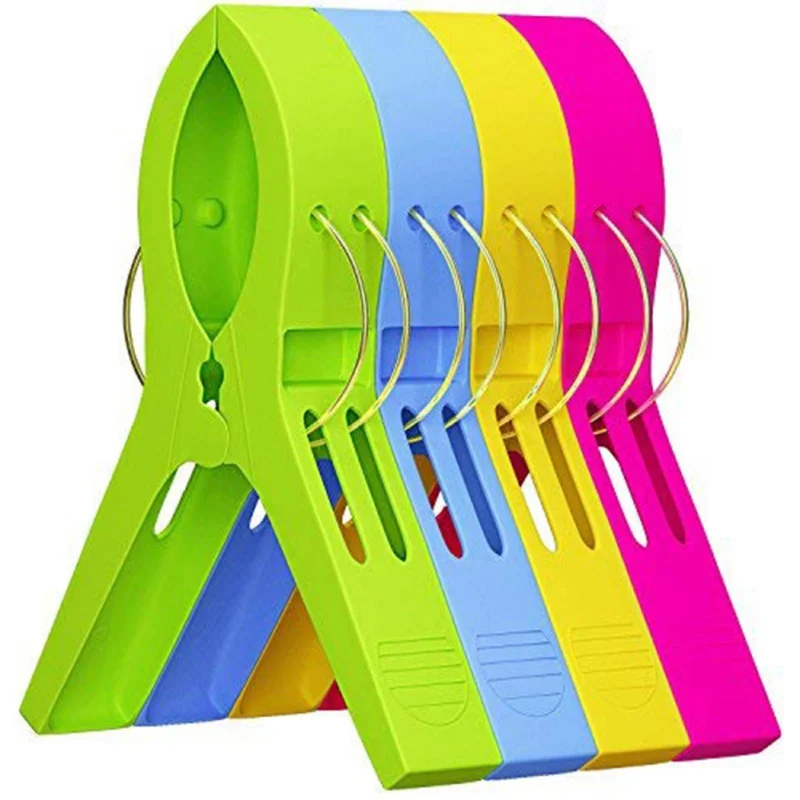 

Pack of 4 Pcs bright color plastic beach towel clips to deck chair Clothes Pegs