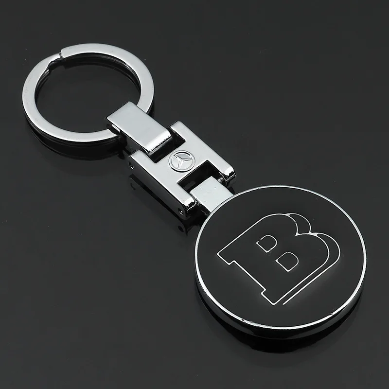 

Keychain Mercedes Benz Babs car logo hollow solid double-sided H buckle car logo car standard metal keychain