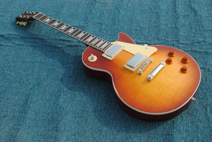 

New Arrival! Custom shop Half a gloss Relic LP electric guitar with tiger striped Maple top tobaccolosed Offer Customized.