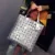 Mujeres pequeña Bao mano plegable mini mango superior baobao bolso de mano geométricos del laser bolso feminina bolsos de hombro monedero