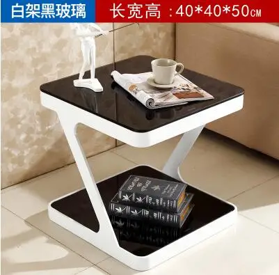 Simple modern tempered glass coffee table. Creative living room small side coffee table. Simple modern tempered glass coffee table. Creative living room small side coffee table.