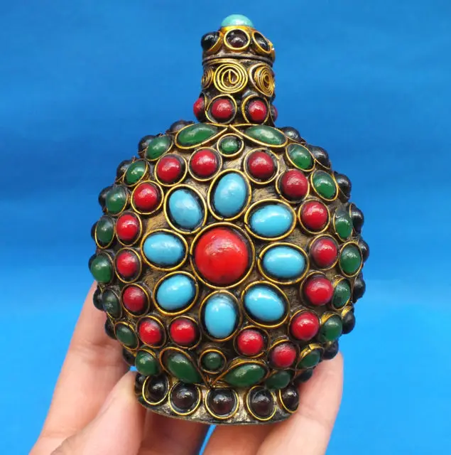 

China Beautiful filigree process gem snuff bottle