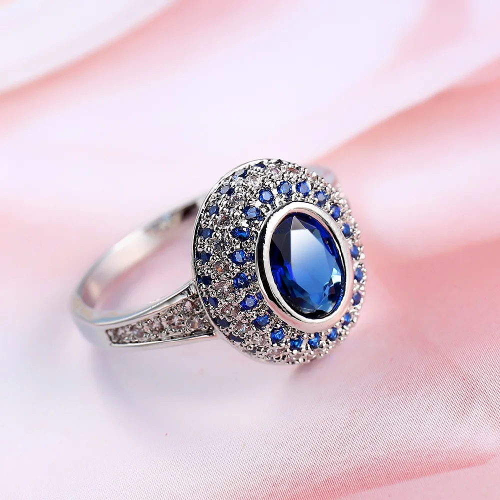 

Prong setting Blue Zircon Halo Ring White Gold Filled Sparkling Wedding Womens Ring Gift