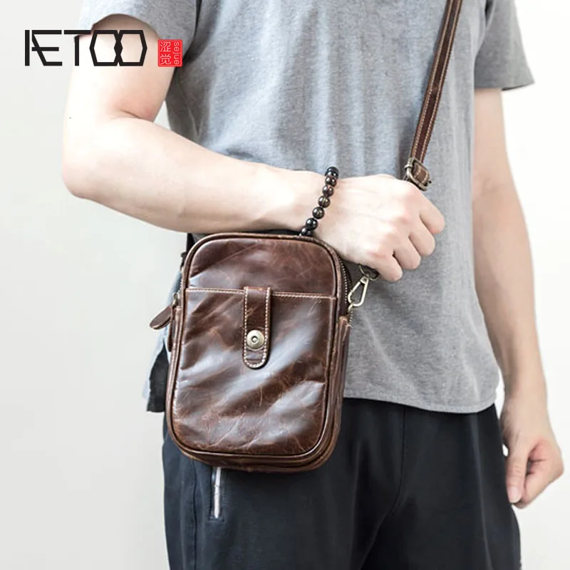 

AETOO Men's Multifunctional Pocket Leather Large-capacity Messenger Bag Practical New Leisure chest bag The first layer of