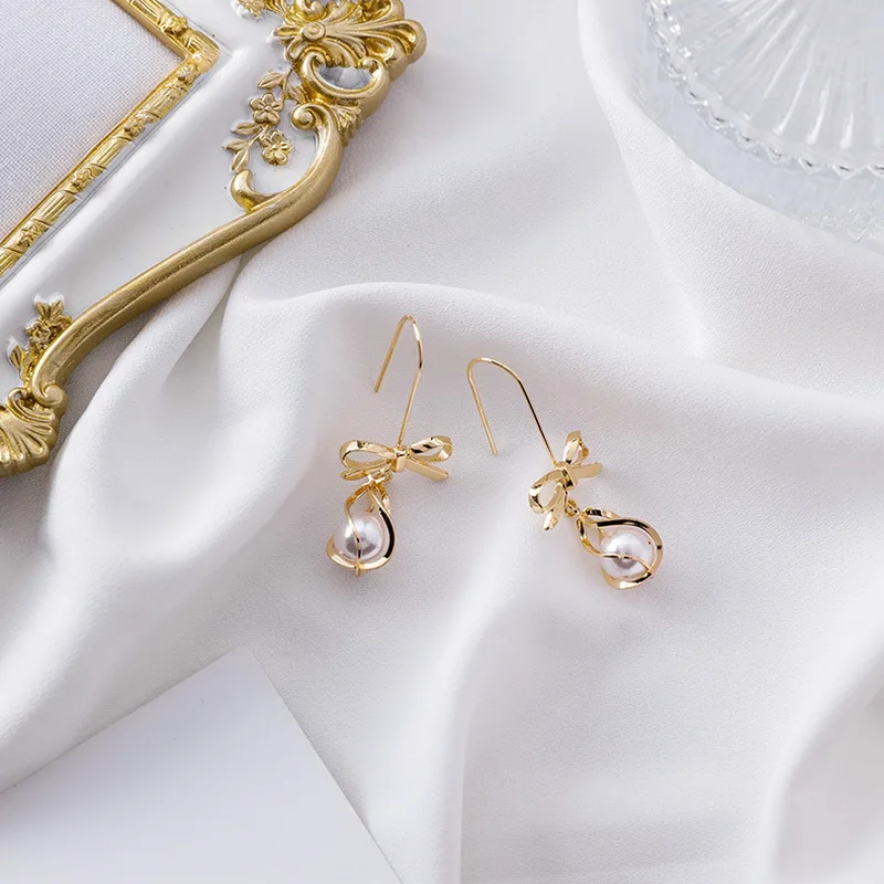 

Sweet Cute Bow knot Imitation Pearl Drop Dangle Hook Earrings Women Fashion Vintage Jewelry Pendientes Brincos Oorbellen ER22