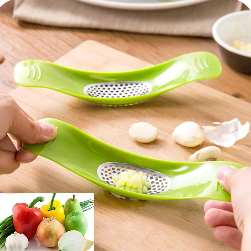 

Creative Garlic Press Vegetable Cutting Tool Manual Kitchen Garlic crusher