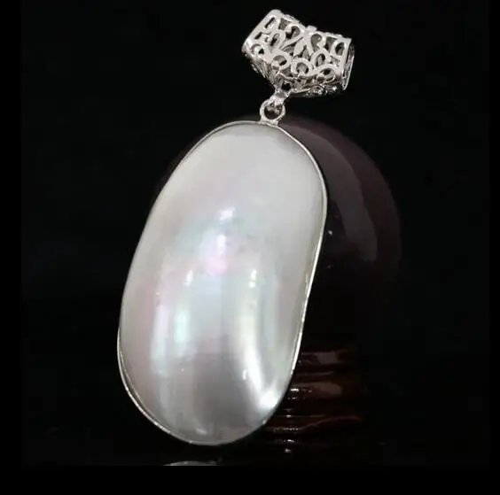 

Natural 29x50mm white mother shell approx oval large pendant