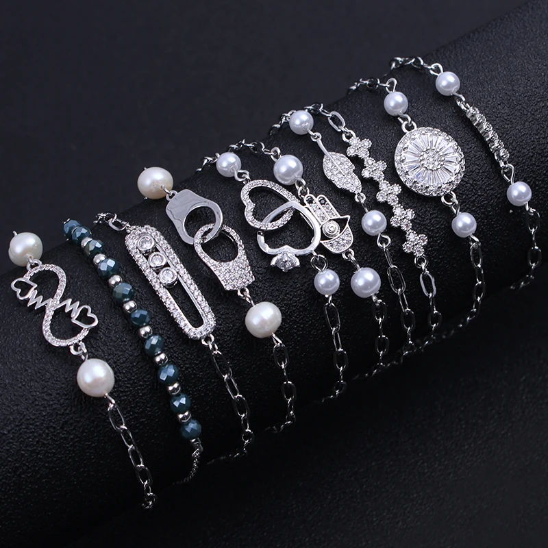 

Stainless Steel Love Heart Leaf Hand of Fatima Bracelets AAA Cubic Zirconia Heartbeat Imitation Pearl Cross Handcuffs Bracelet