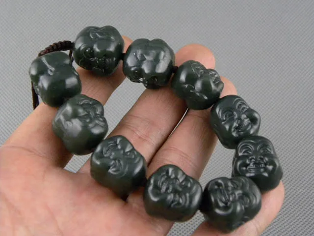 

Xinjiang Hetian jade bracelet jade Buddha head.