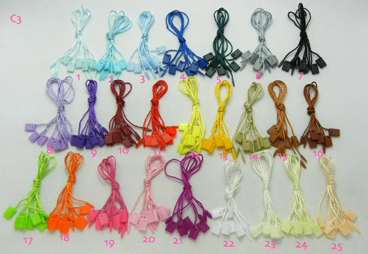 Шнуры разноцветные/ /бирка с веревкой/пластиковая бирка