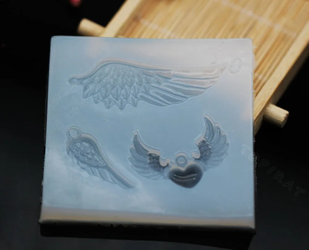 

1PCS DIY Craft Liquid Silicone Expoxy Resin Mold Wing Feather Heart Jewelry Mold UV Pendant Jewelry Accessories