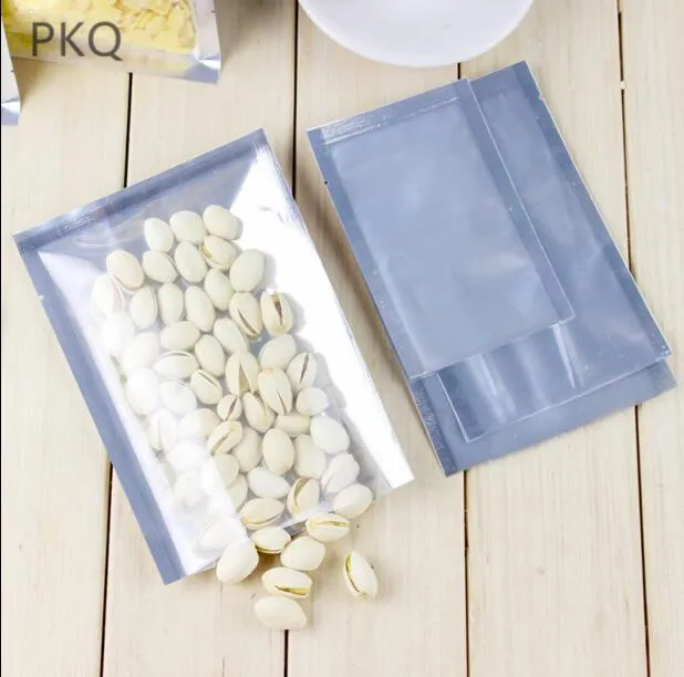 

1000pcs 5*7cm Heat-seal vacuum Aluminum foil Plastic bag Food packaging bags. One Side transparent Wholesale Free shippping