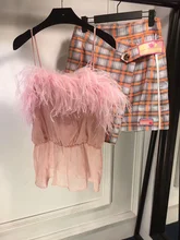 Chun xia new star with sweet pink ostrich feather coat + grid irregular a-line skirt suits female