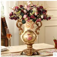 The vintage European porcelain vase with the big vase is the American home furnishing the living room and the flower in the livi club tunes the big room edition