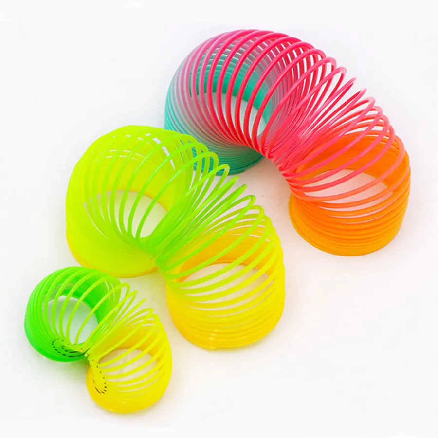 

1Pcs Multi style Magic Rainbow Circle Funny Toys Kindergarten Development Educational Folding Plastic Spring Coil Gift Kids Toy