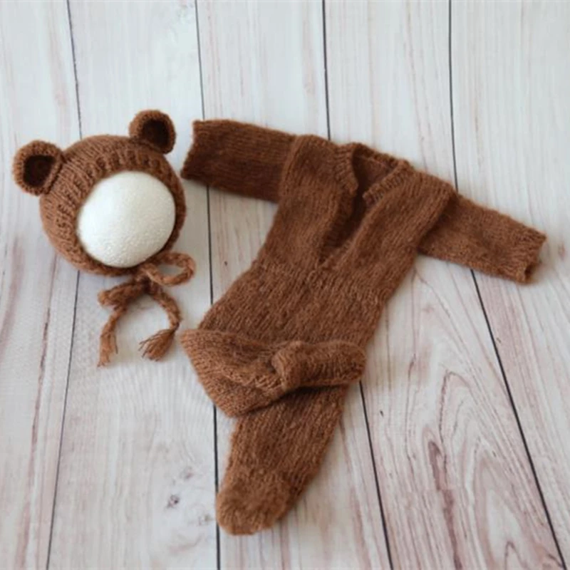 生まれたばかりの赤ちゃんのためのニットフード付きロンパース手作りの新生児写真アクセサリーかぎ針編みのセット