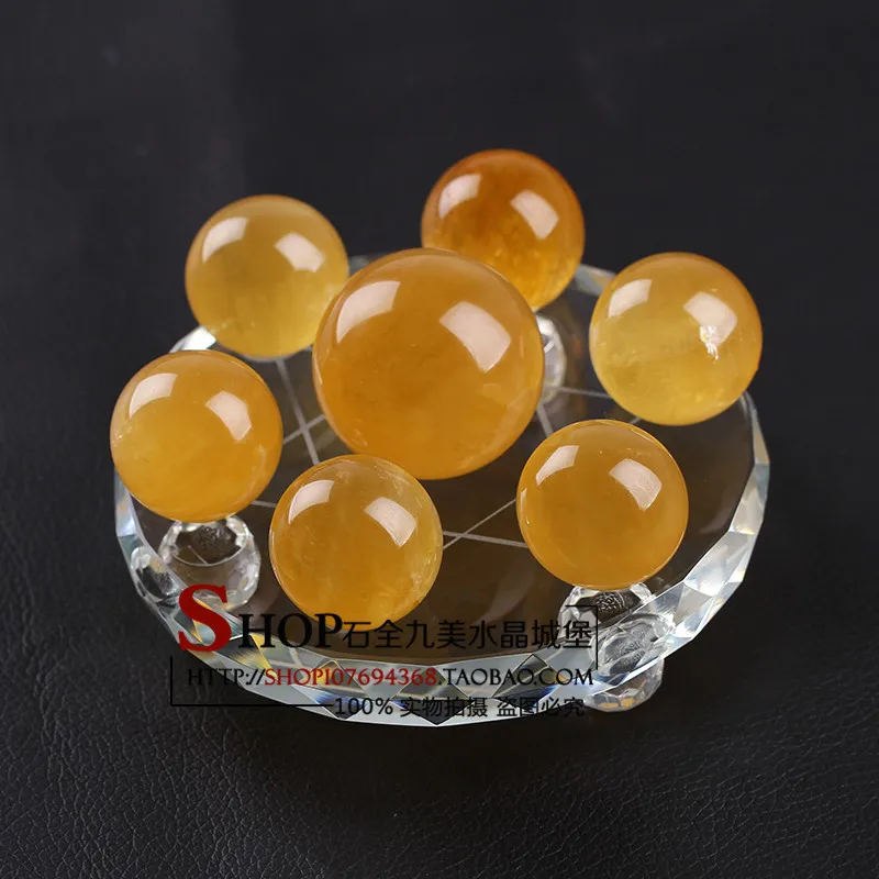 

Natural yellow crystal ball ornaments seven array gas gathering Wangcai Topaz lucky feng shui ornaments