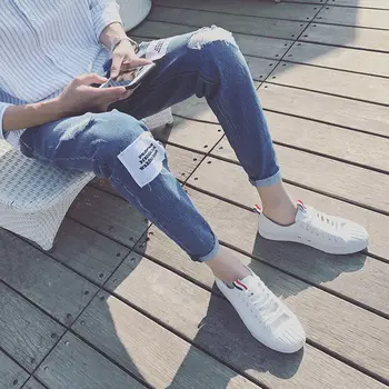 

Spring and summer new hole jeans men's loose straight casual Korean fashion student beggars pants