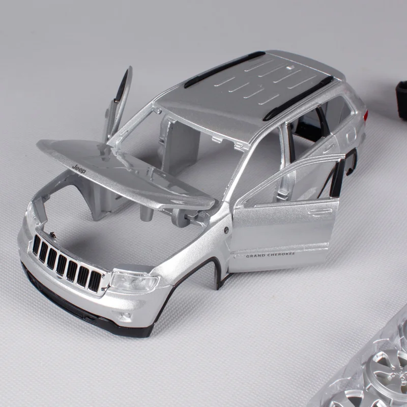 Maisto 1 24 Jeep Grand Cherokee Laredo Suv Embly Diy Cast Maisto 1 24 Jeep Grand Cherokee Laredo Suv Embly Diy Cast Model Car Toy New In Box Free Shipping 39215 Building Kits From Toys Hobbies On