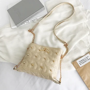 

2019 British fashion simple shell bag women's designer handbag high-quality PU leather rivet tassel chain shoulder bag qq353