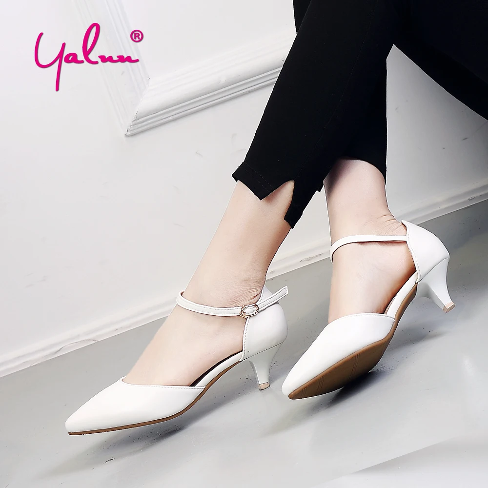 pointed buckle heels