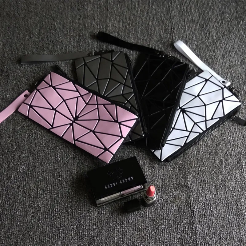 

2020 New Geometric Zipper Cosmetic Bag Women Luminous Makeup Bag Ladies Cosmetics Organizer Folding Travel Make Up Bag wholesale