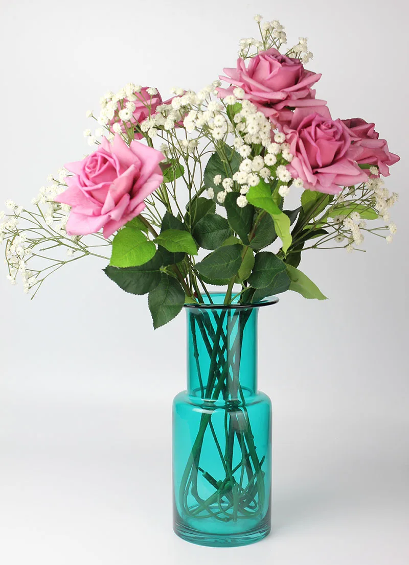5 gray purple 5 babybreath in a vase