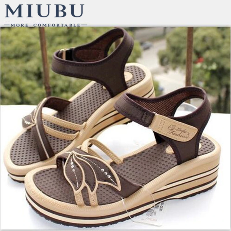 Miubu فيتنام الأحذية الصنادل الإناث الصنادل أسافين الأحذية النسائية وجيزة منصة زهرة شحن مجاني