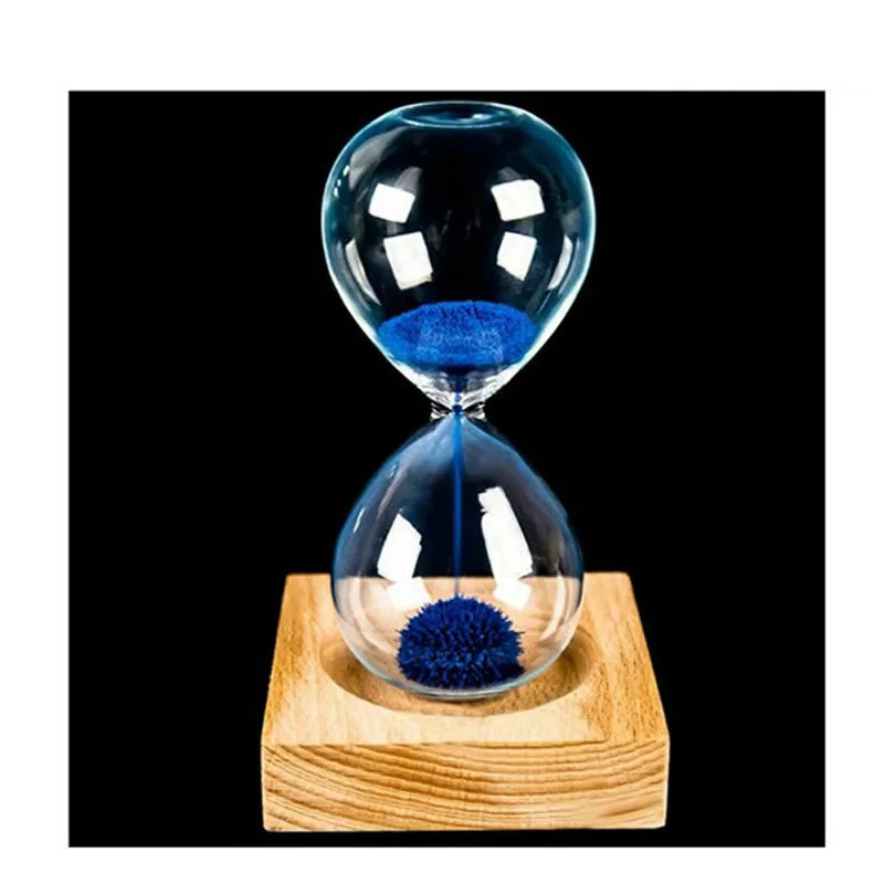 

wood + glass + iron powder sand iron flowering magnetic hourglass 13.5 * 5.5cm wooden seat with packaging Gift