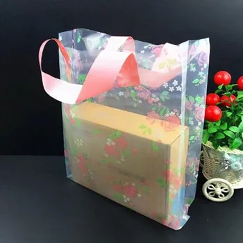 

Wholesale 50pcs/lot White/Pink Flower Plastic Bag Shopping Jewelry Packaging Plastic Gift Bag With Handle