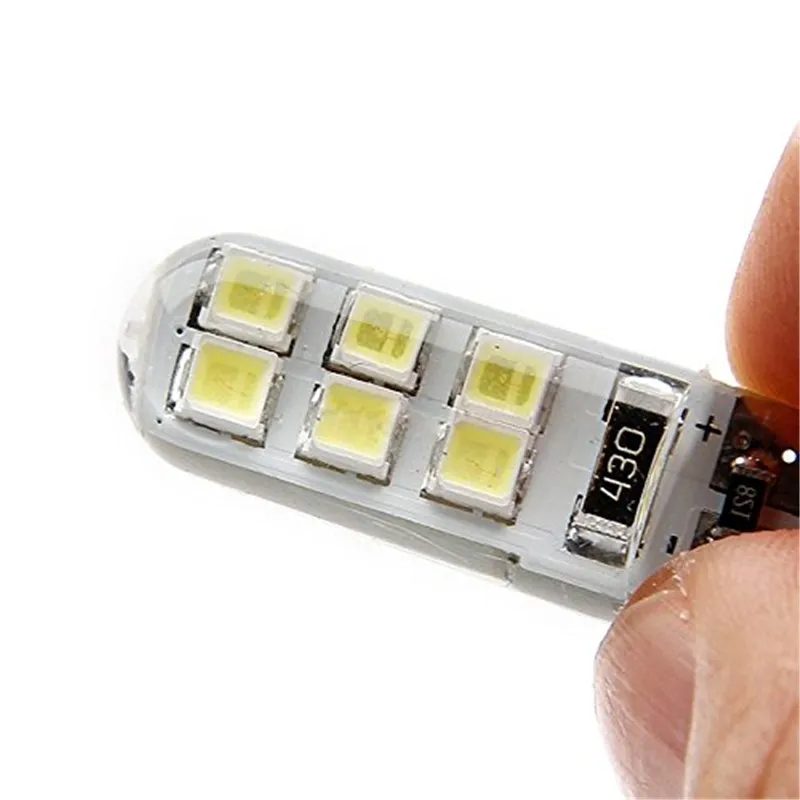 100 шт. T10 194 168 W5W 2835 Чип 12SMD кремнезема Автомобильная дверь с электроприводом Лицензия светодиодный свет Клин для лампы свет 7 видов цветов