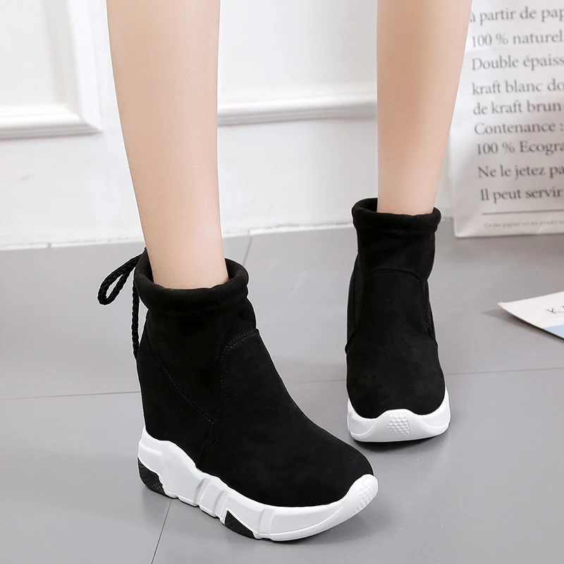 

Autumn and winter Korean version of the wild riding boots fashion high to help plus velvet cotton shoes thick women's boots.