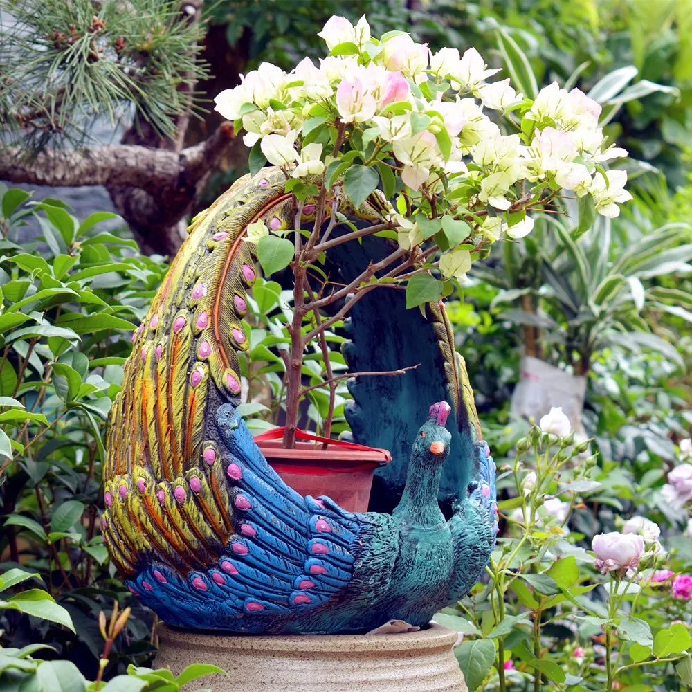 

Garden courtyard A flower pot act the role ofing is tasted peacock resin flowerpot Creative garden Flower arrangement is