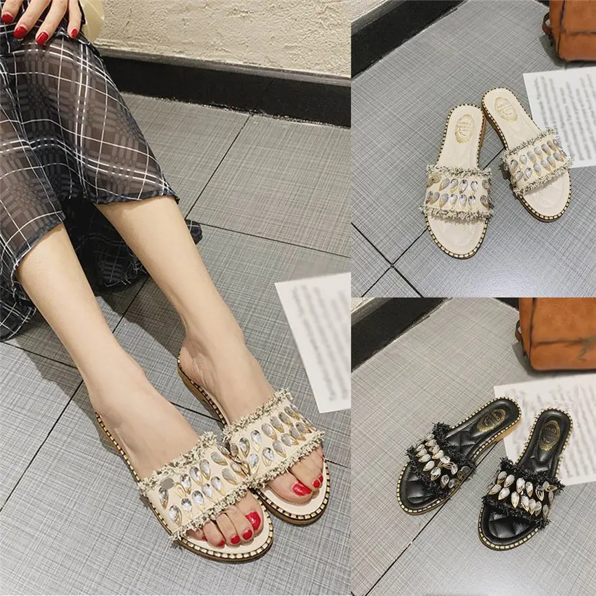 

Women's Slipper FashionWomen's Summer Rhinestones Literally Beach Sandals And Wild Flat Bottom Slippers A#30