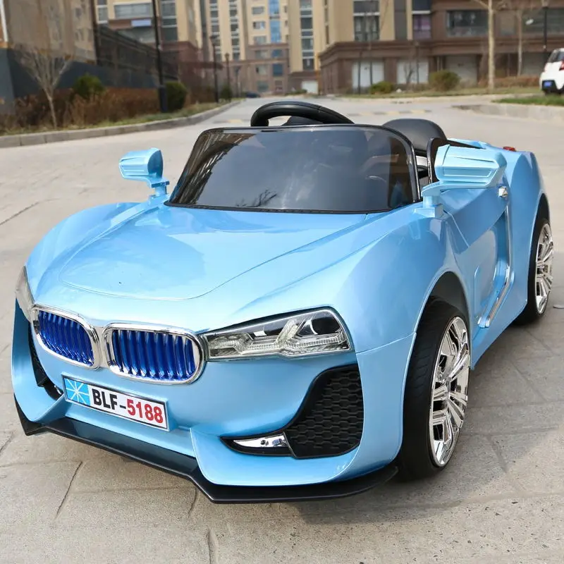 

Free Shipping 2.4G Bluetooth Flash Light Wheel Remote Double Open Door kids Ride On Electric Baby Stroller Dual Drive Music Car