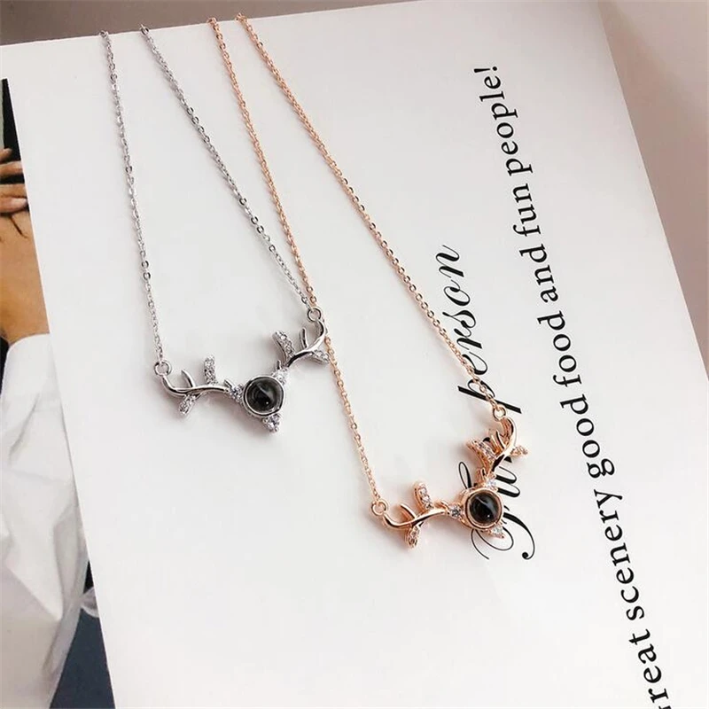 

Korean style projection i love you 100 language antler necklace The Road Less Traveled clavicle necklace women