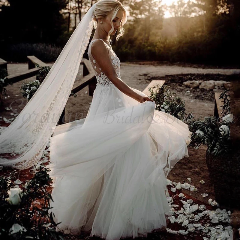 

2019 V-Neck Exquisite Beaded Appliques Romantic A-line Wedding Dresses Sexy Straps Backless Sleeveless Boho Bridal Gowns AX195
