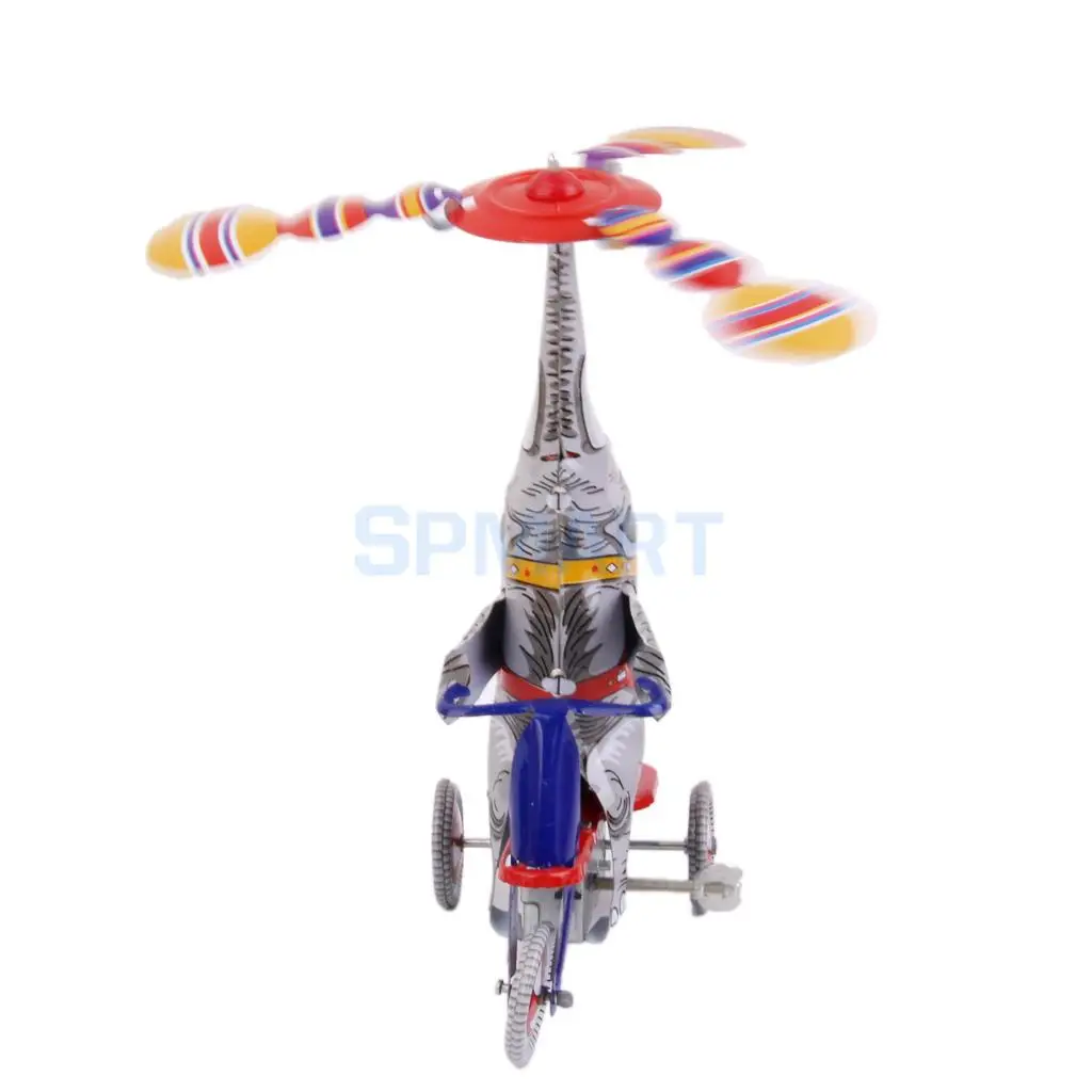 

Wind Up Circus Elephant Nose on Tricycle Clockwork Toy Collectible