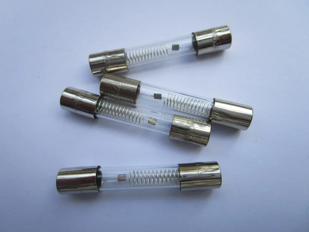 

Glass Fuse Fast Blow 5KV 6mm x 40mm 0.7A 700mA 10 pcs per Lot