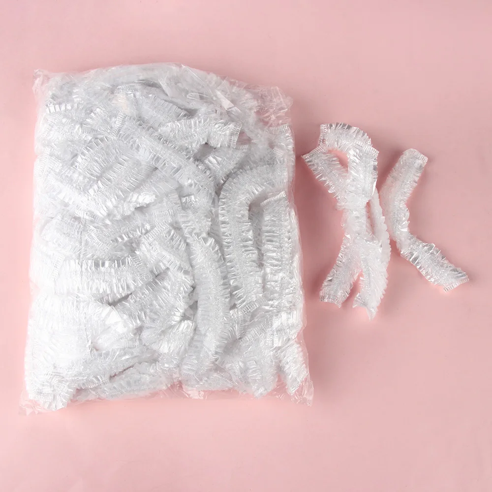 

100Pcs/bag Disposable Shower Caps Bathroom Beauty use Transparent plastic waterproof Modeling tool Hats Hair Travel Accessories