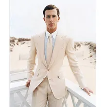 A man’s suit with ivory lapel for the formal occasion of a man’s wedding outfit (top + trousers)