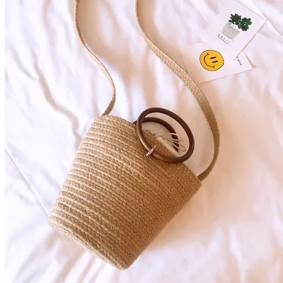 

2018 hot sales handmade cute bucket bag straw bags beach bags bucket holiday Braided bags for girls Bohemian girls woven Handbag