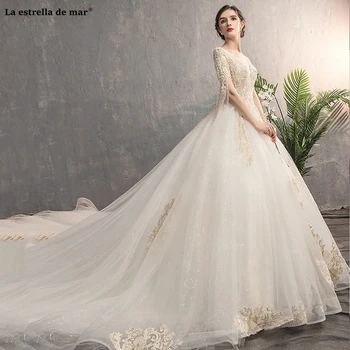 

robe de mariee 2020 new lace fringed crystal half-sleeve ALine champagne gold church luxury beaded lace wedding dress tail brida