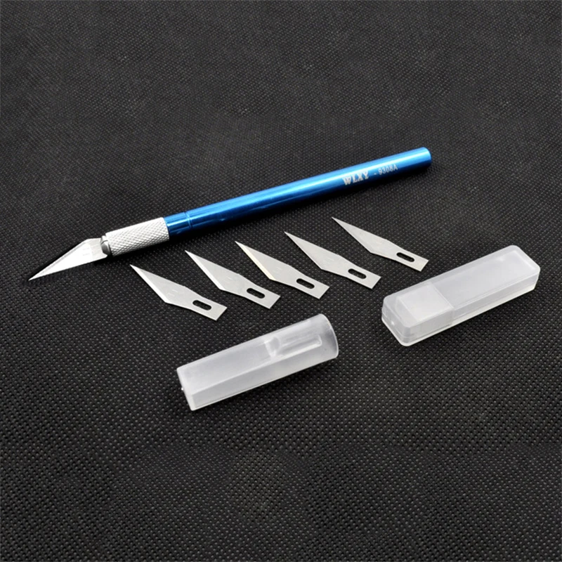 скальпель со сменными лезвиями. скальпель со сменными лезвиями. нож-скальпель rexant 12-4917. набор скальпель со сменными лезвиями rexant 7 предметов 12-4917. скальпель со сменными лезвиями.