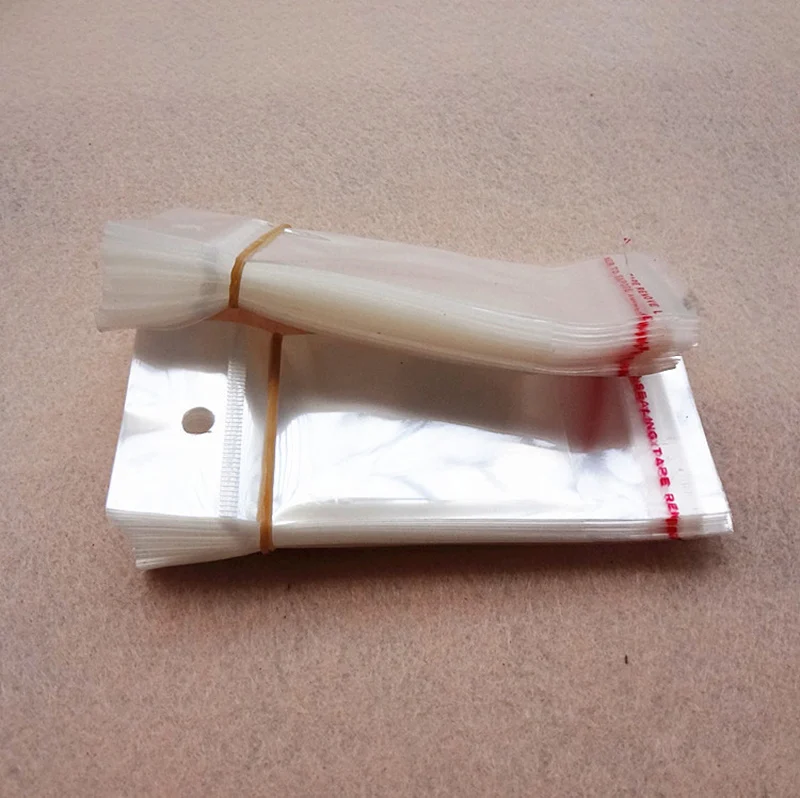 100pcs 7x14cm Clear Self Adhesive Seal Plastic Bags Transparent Resealable OPP Packing Poly Bags Pick Beads Hanging Holes