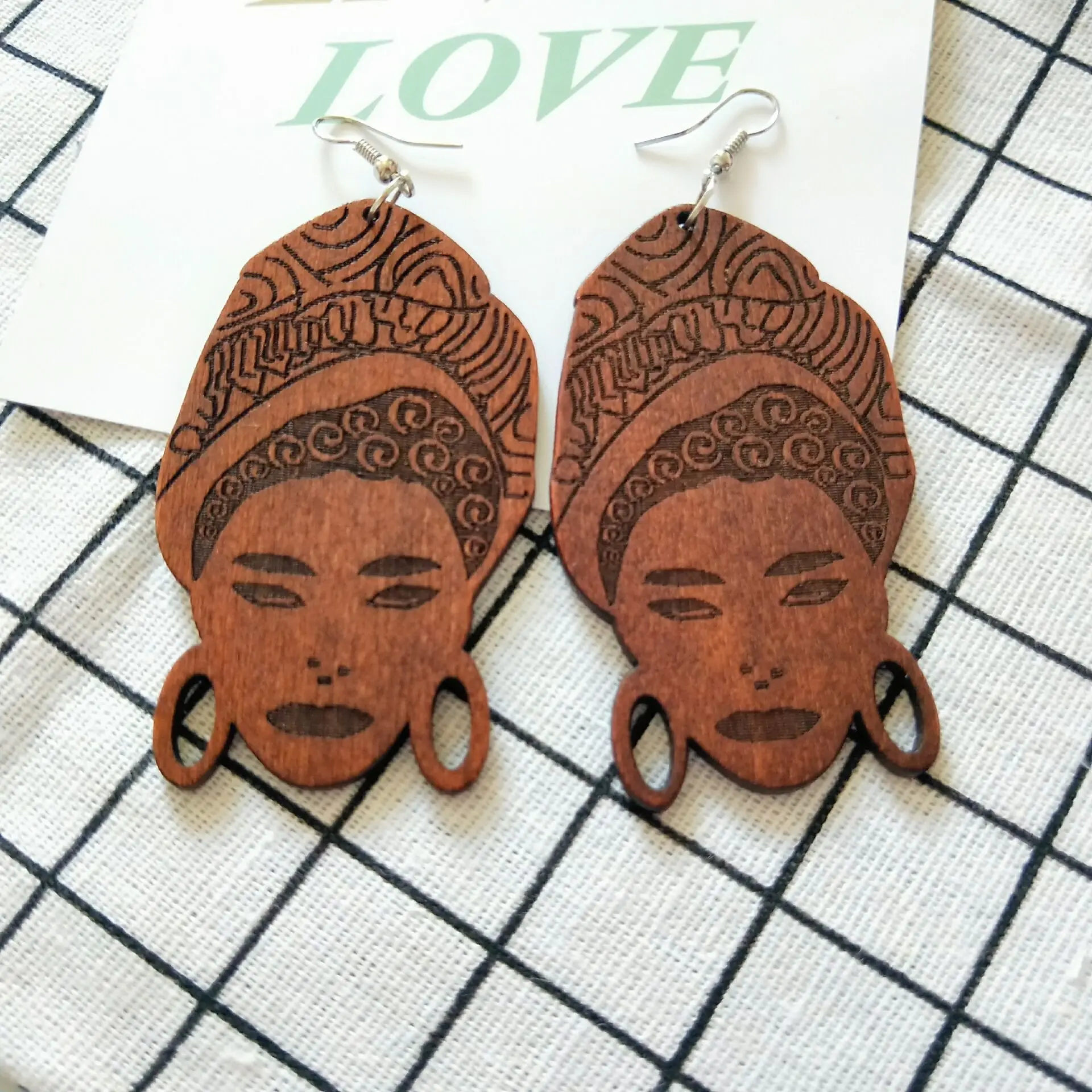 

THRWELL Magnificent Earrings Fashion Laser Sculpture Brown Retro African Head Earrings Ear Nail Women Factory Direct Wholesale