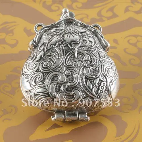 

1pcs Tibetan silver two sides two holes flower locket charm G1708