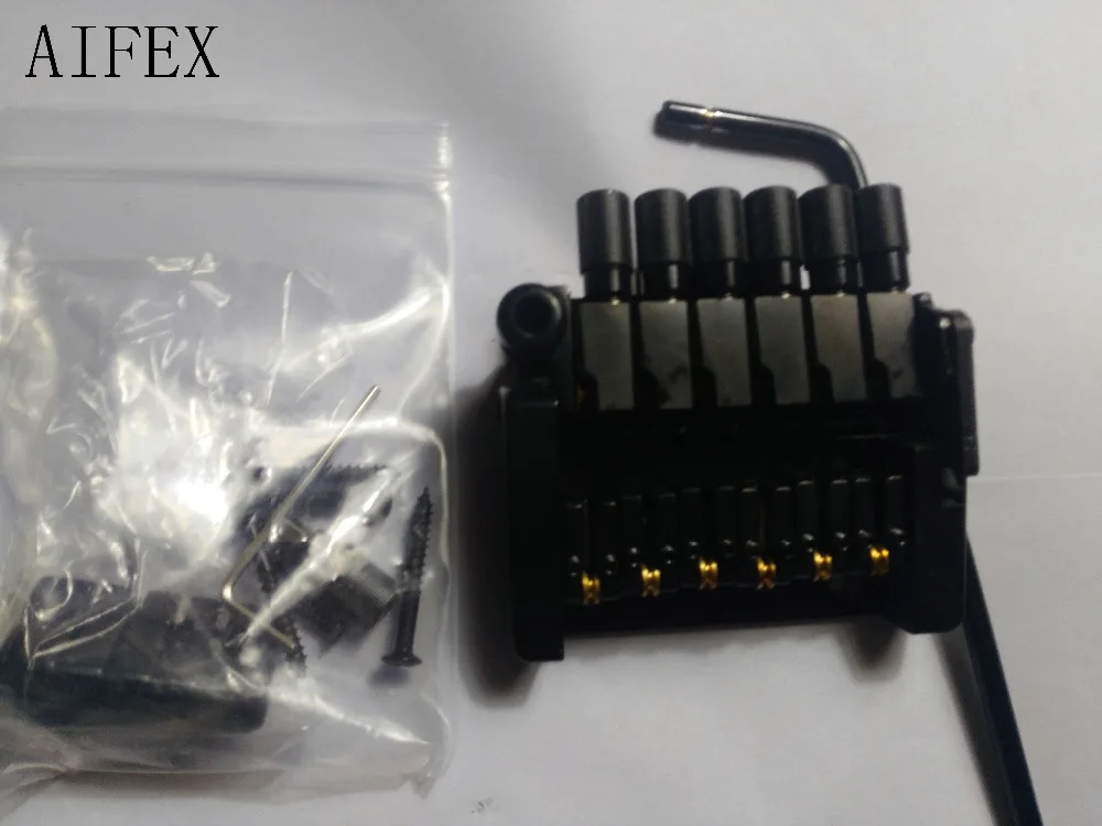 New Black 6 Strings Guitar Tailpiece Tremolo Bridge Roller saddle Tremolo Bridge Tailpiece for Tremolo Bridge /w Arm & Nut from New Black 6 Strings Guitar Tailpiece Tremolo Bridge Roller saddle Tremolo Bridge Tailpiece for Tremolo Bridge /w Arm & Nut from
