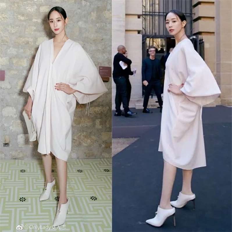 

Zhang June Ning Paris Fashion Zhou Mingshing The Same Korean Version of The New Deep V Pink Fairy Wide-sleeved Dress 2019